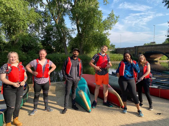 A group of young people kayaking