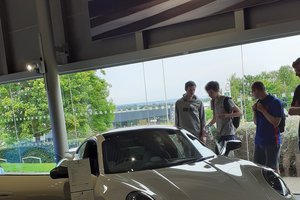 YP looking at car Porsche.jpg