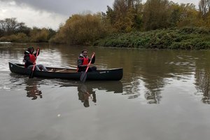 a couple of males in boats.jpg